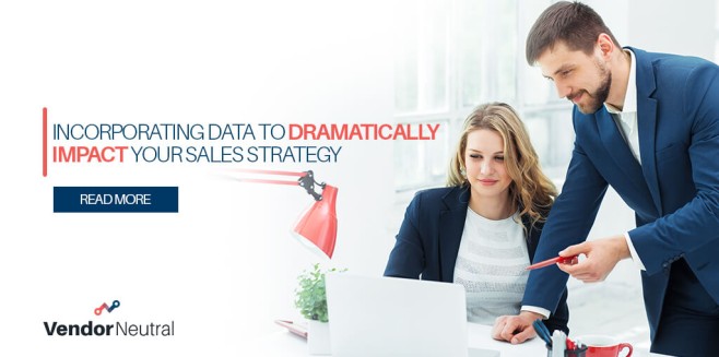 The Power of a Data-Driven Sales Strategy blog image of man and woman looking at computer