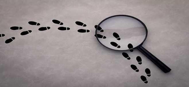 Sales Technology Buying Guide | Selecting a Vendor Magnify glass and footprints blog Image